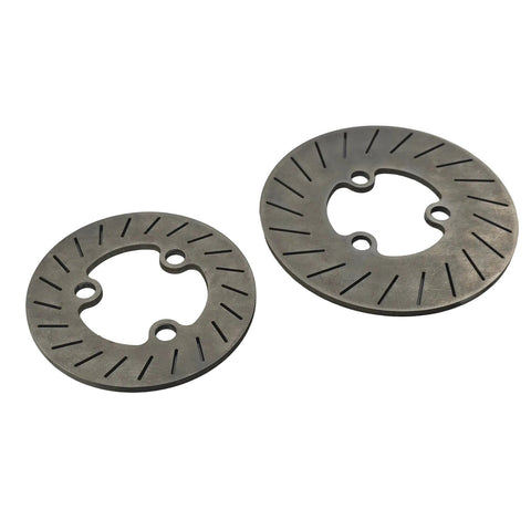 Titanium outlaw kart left front brake rotors laid flat showing the machined rotor faces