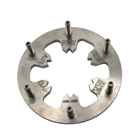 Titanium clutch parts stacked to show the two disk pack layout