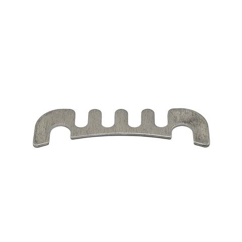 Aluminum brake caliper shim held in hand showing 1/16 inch thickness