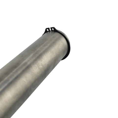 Snap ring seated in the groove at the end of a 1.25 inch outlaw kart axle to retain the rear hub
