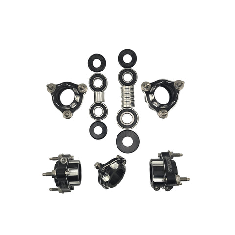 Five Three Titanium Revolver 1/4-28 outlaw kart hub kit with all four wheel hubs and rear brake hub laid out