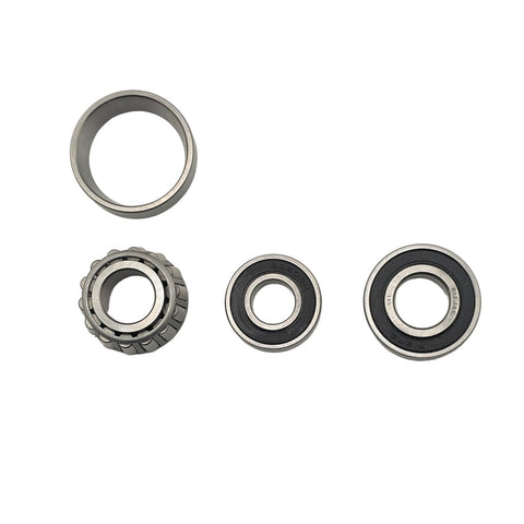 Tapered kart front hub bearing with its matching race next to the sealed ball bearings