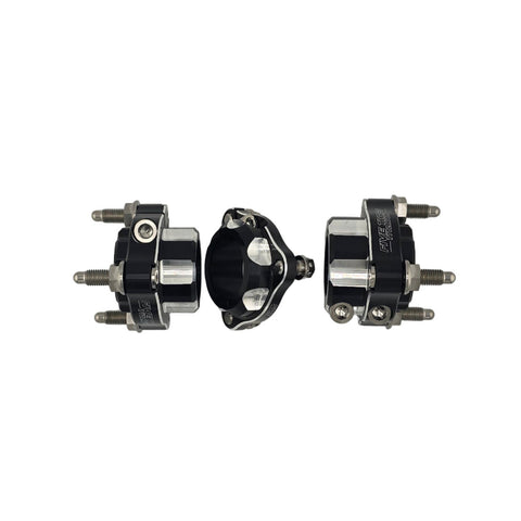 Rear hub kit laid out with hardware ready to install on a go kart axle