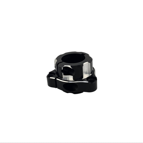 Two 5/16-18 pinch bolt bosses that clamp the hub to a 1.25 inch kart axle