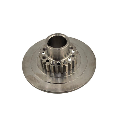 Two disk titanium clutch components laid out before assembly