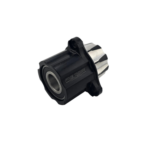 Face of the right front kart hub showing the Revolver machined pockets