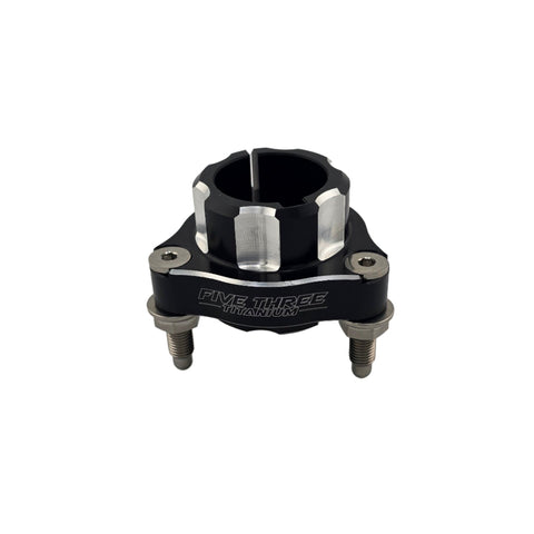Back face of a Revolver rear hub showing the recessed flush stud pockets
